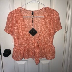 Orange and white flower blouse